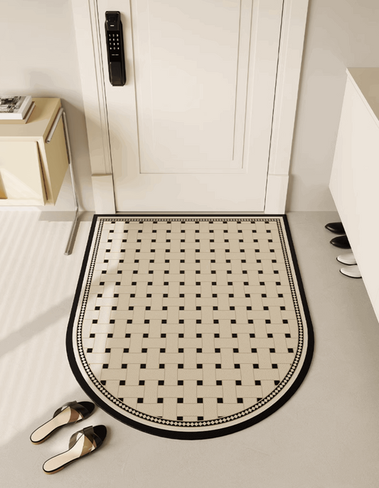 Zuumat checkerboard door mat-enterway in black and white placed in front of a white door